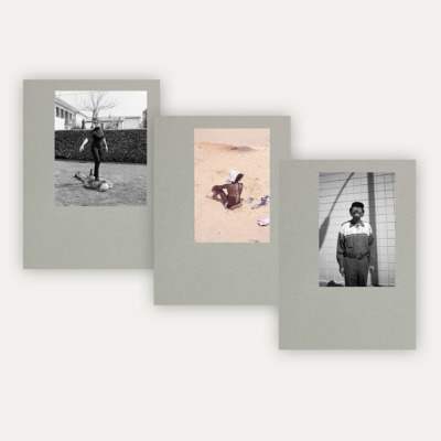 A photograph of three books laid in a line.