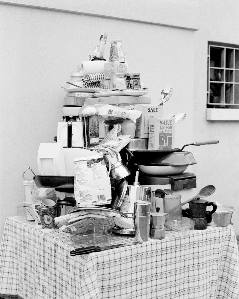 A pile of kitchenware on a table