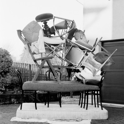 All the chairs in the Agostini house, piled in the front garden.