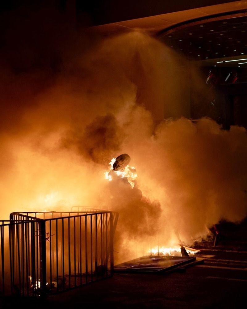 A raging inferno on engulfs barricades on the streets of Hong Kong.