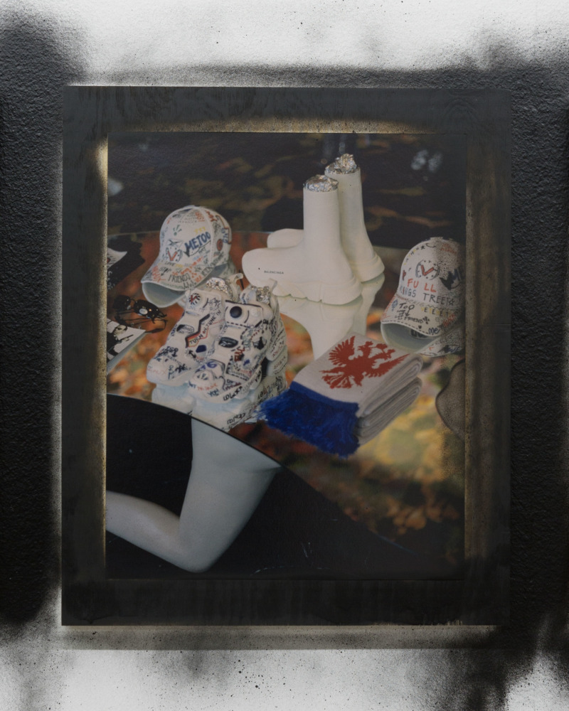 A spraypainted frame containing a still life.