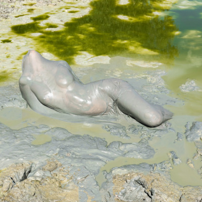 A headless torso poses seductively in a pearlescent pool.